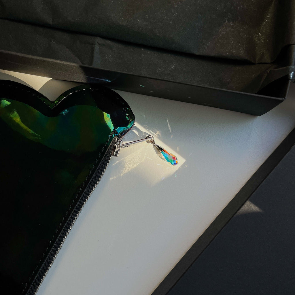 3. Close-up of Tairi Roosve Leather Cloud Purse with Swarovski crystal zip detail