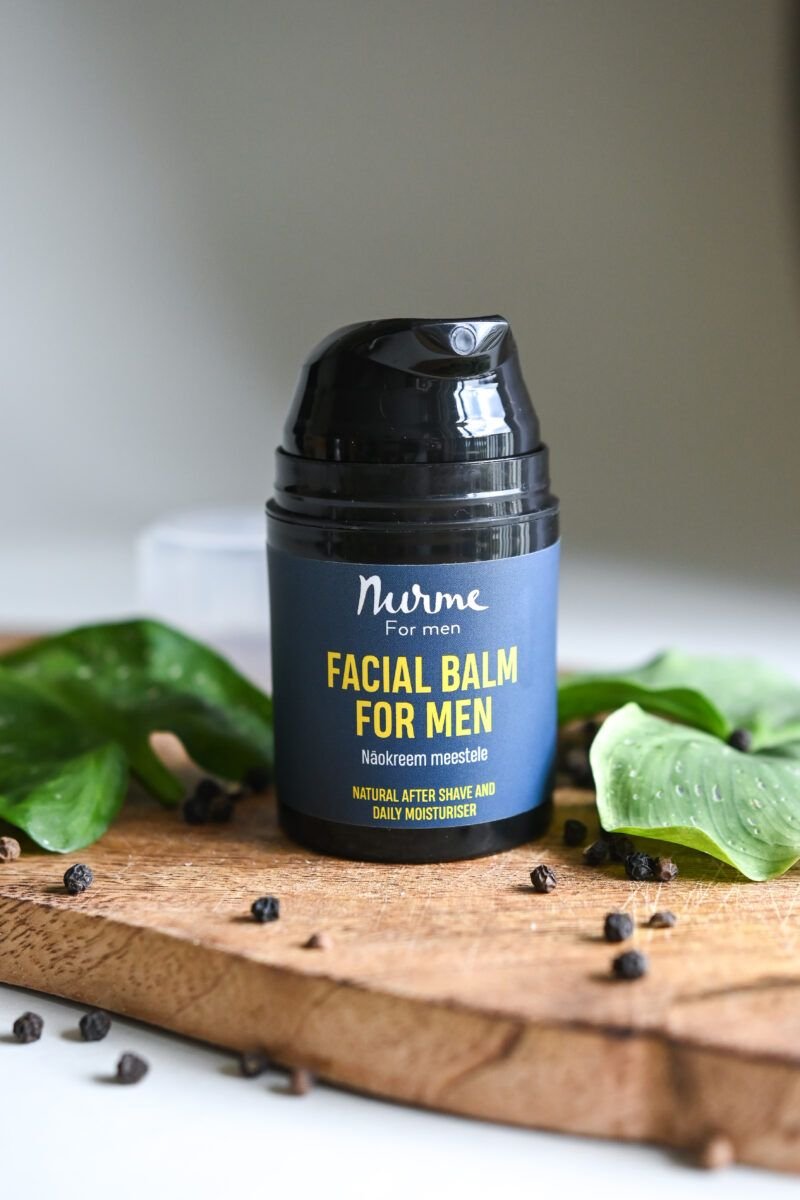 1. Nurme men's facial balm for after shave and daily moisturizing, shown with natural ingredients in lifestyle setting
