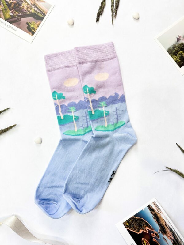 1. SEIK Estonian bog-inspired socks in pastel colors, flat lay with nature-themed design