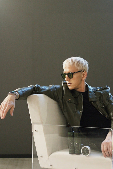 1. Men's Daily Essentials Gift Set by Magrada Organic Cosmetics, featuring oak shampoo, solid shampoo, and shower gel, displayed with male model in lifestyle setting