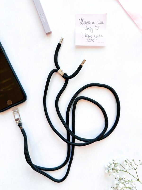 4. Close-up of SEIK Universal Phone Strap in Midnight, highlighting design and material