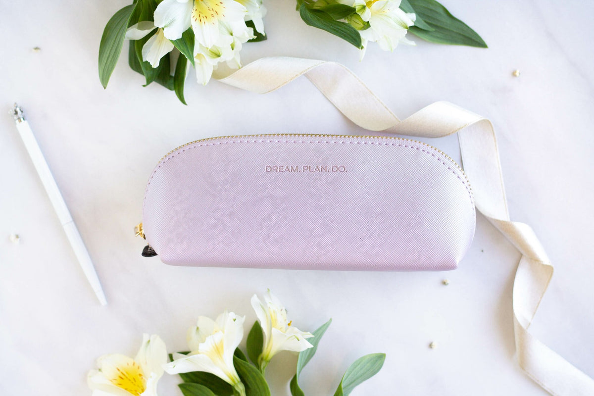 1. SEIK purple pencil case with 'DREAM. PLAN. DO.' text, styled with flowers and ribbon