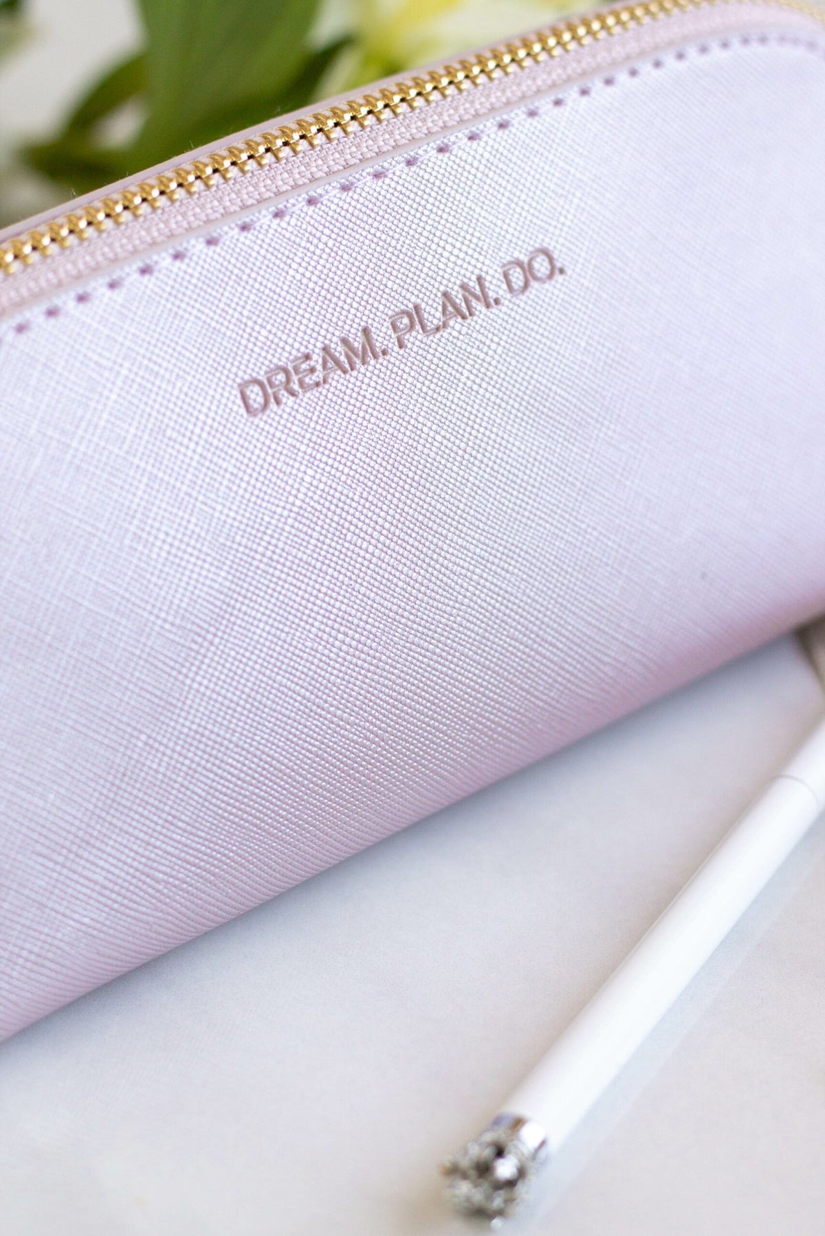 3. Close-up of SEIK purple pencil case showing 'DREAM. PLAN. DO.' text and texture