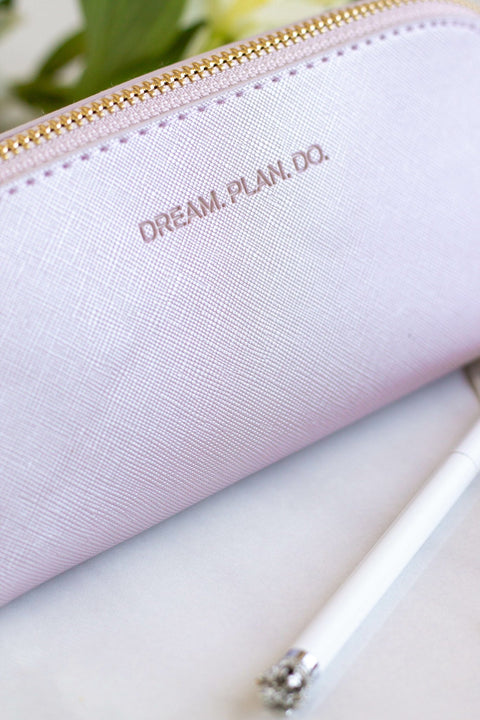 3. Close-up of SEIK purple pencil case showing 'DREAM. PLAN. DO.' text and texture