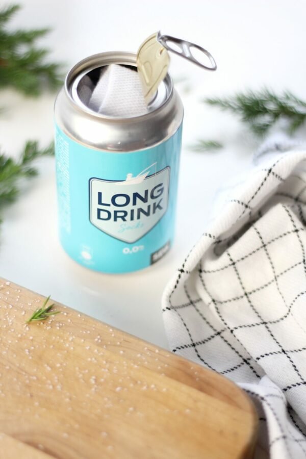 2. SEIK Long Drink can with socks inside, surrounded by greenery and checkered cloth