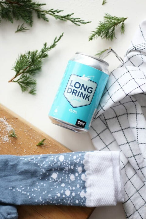 4. SEIK Long Drink Socks in blue with white speckles, shown with Long Drink can and checkered cloth