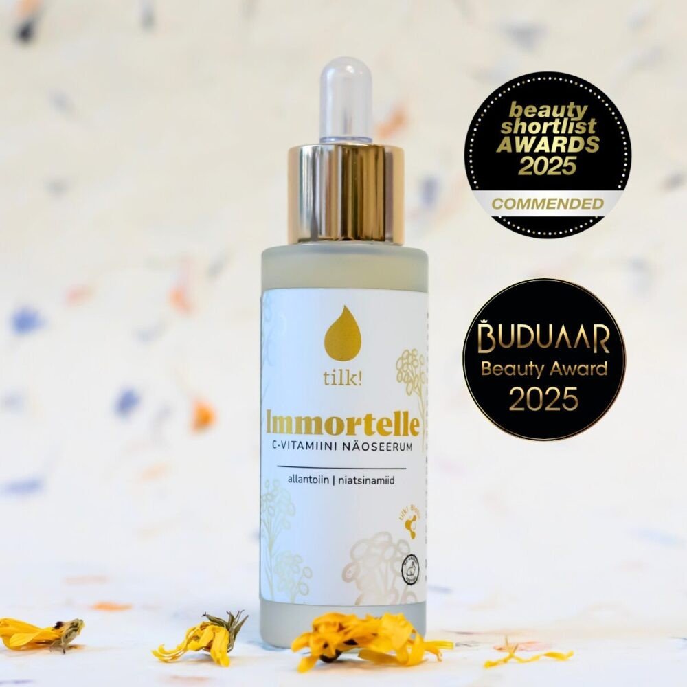 1. Tilk! Immortelle Face Serum with Vitamin C, Allantoin, and Niacinamide, 30ml, shown with beauty awards in background