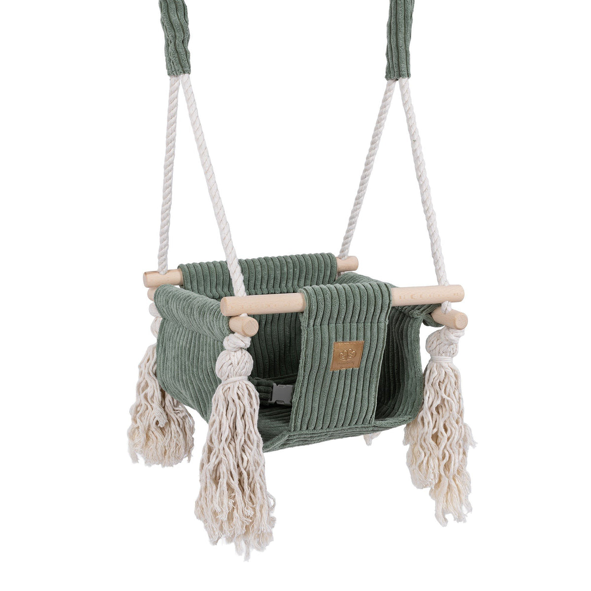 1. Olive green indoor baby swing with corduroy seat, wooden elements, and decorative fringes, designed for infants, shown hanging with white cotton ropes