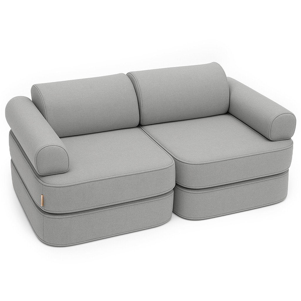 1. Fog grey modular children's sofa with two double mattresses, two headrests, and two armrests, shown in a studio setting, ideal for indoor and semi-outdoor use