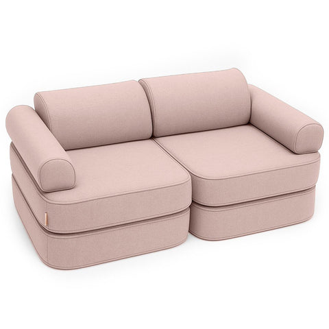 1. Children's modular sofa in rosy dune pink with two double mattresses, two headrests, and two armrests, shown in a studio setting