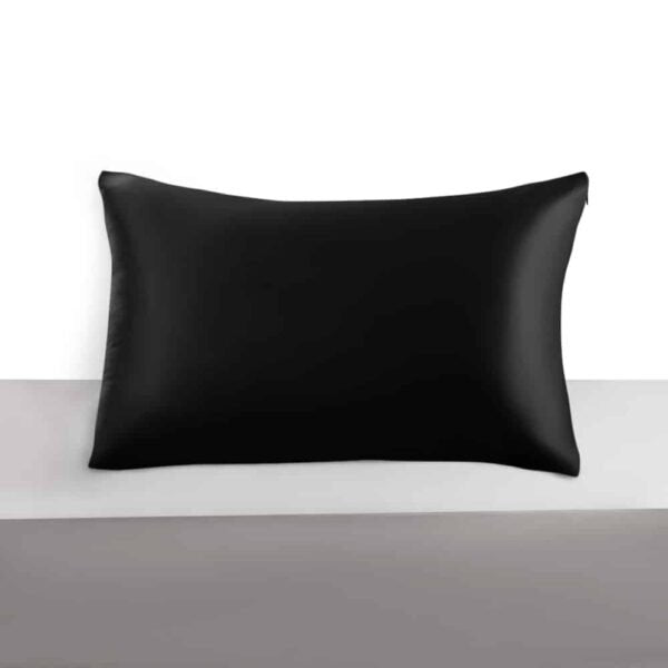 5. Black Mulberry silk pillowcase on a grey surface, highlighting elegant design