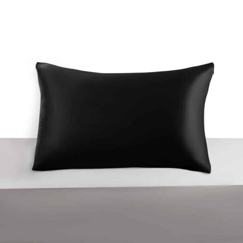 5. Black Mulberry silk pillowcase on a grey surface, highlighting elegant design