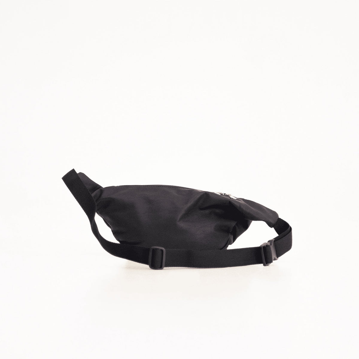 4. Studio side view of Papillon Leather Bum Bag No. 22 in black, highlighting sleek design and adjustable strap