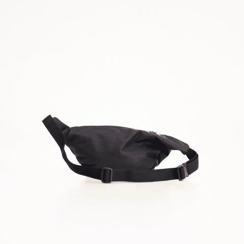 4. Studio side view of Papillon Leather Bum Bag No. 22 in black, highlighting sleek design and adjustable strap