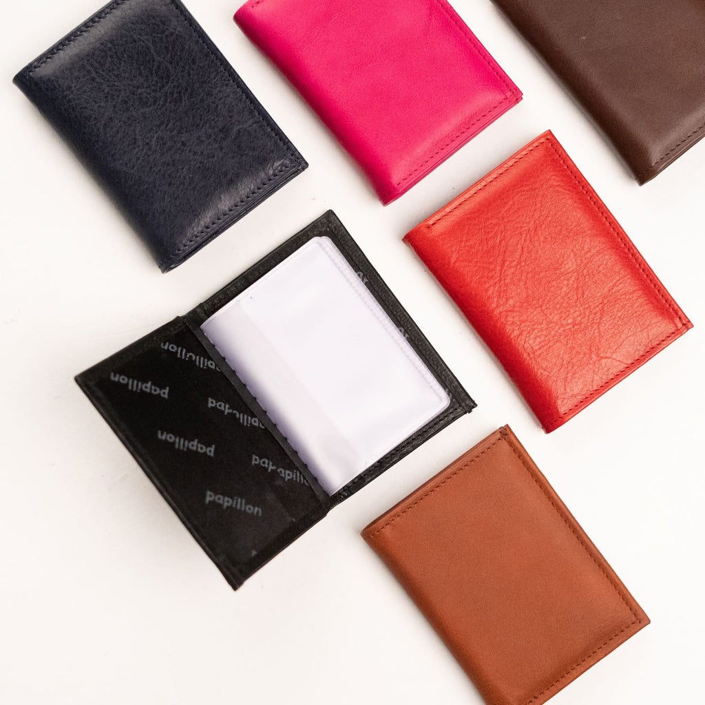 2. Close-up of Papillon Leather Card Holder 21-46 in various colors, highlighting interior card slots and branding
