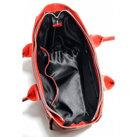 4. Interior view of Papillon Leather Handbag No. 35-29 in cognac, showing spacious compartments