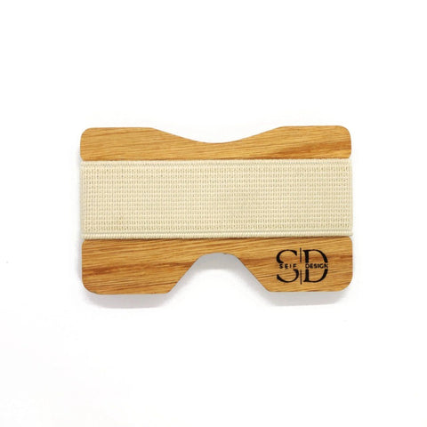 1. Oak card holder with white elastic band by Seif Design, featuring minimalist design and RFID blocking, studio shot