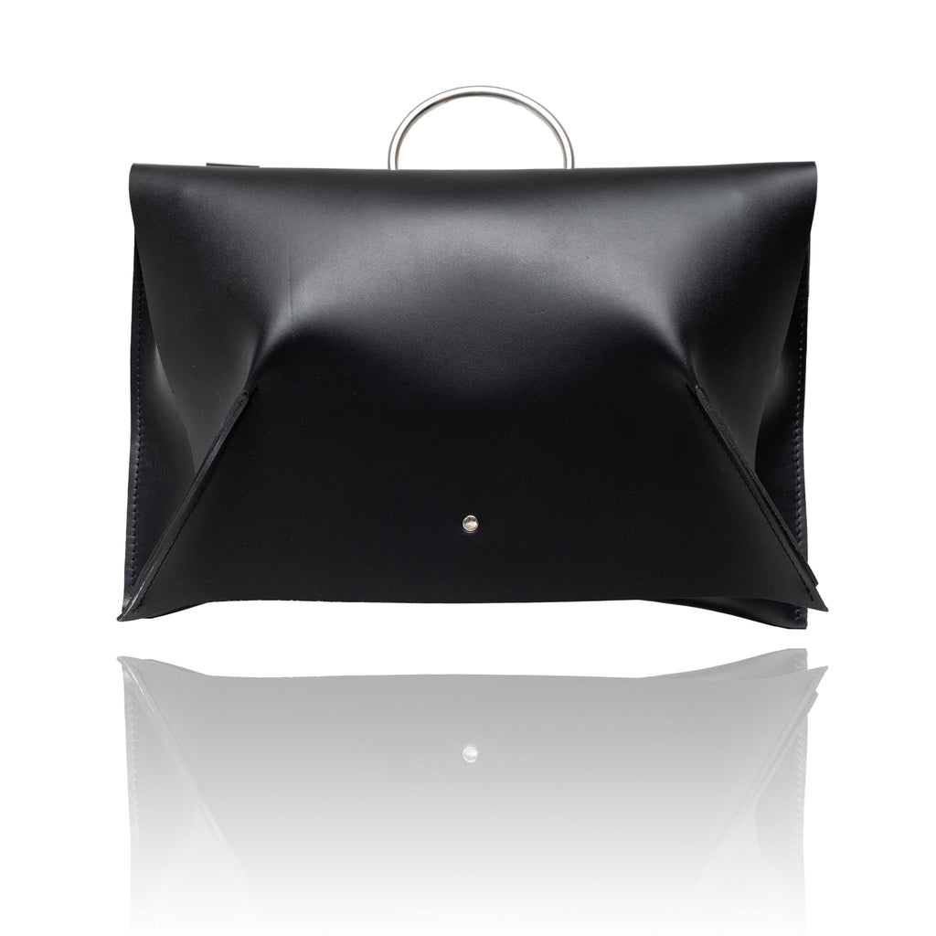 4. Front view of black leather Handbag Kamila by PYKOK, highlighting sleek design, studio shot