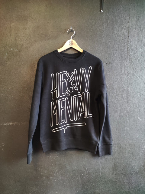 1. Black Heavy Mental sweatshirt with bold white print, hanging on a wooden hanger against a textured wall