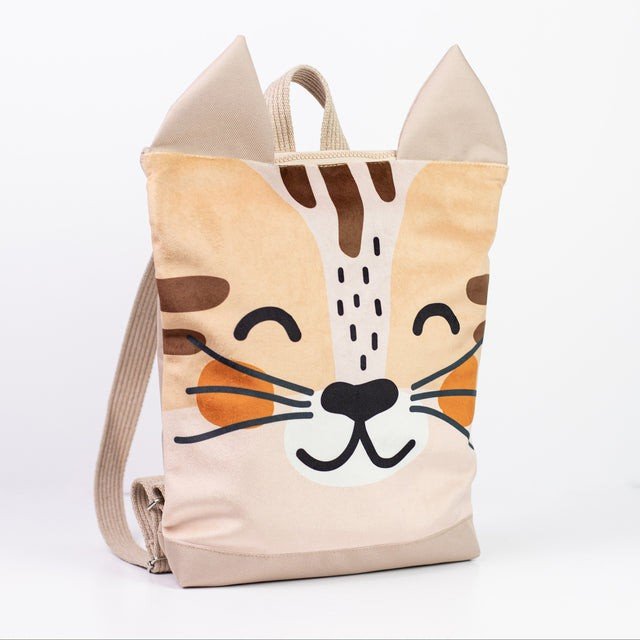 2. Side view of MUNI cat backpack with beige velvet fabric and cat face design