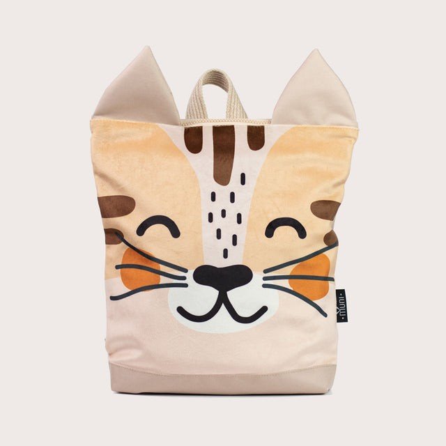 2. Kids' cat-themed backpack with beige velvet fabric and MUNI logo on clean background