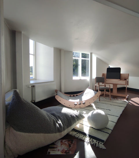 1. Playroom with Luula Kids Bean Bag Chair, wooden furniture, and plush toys