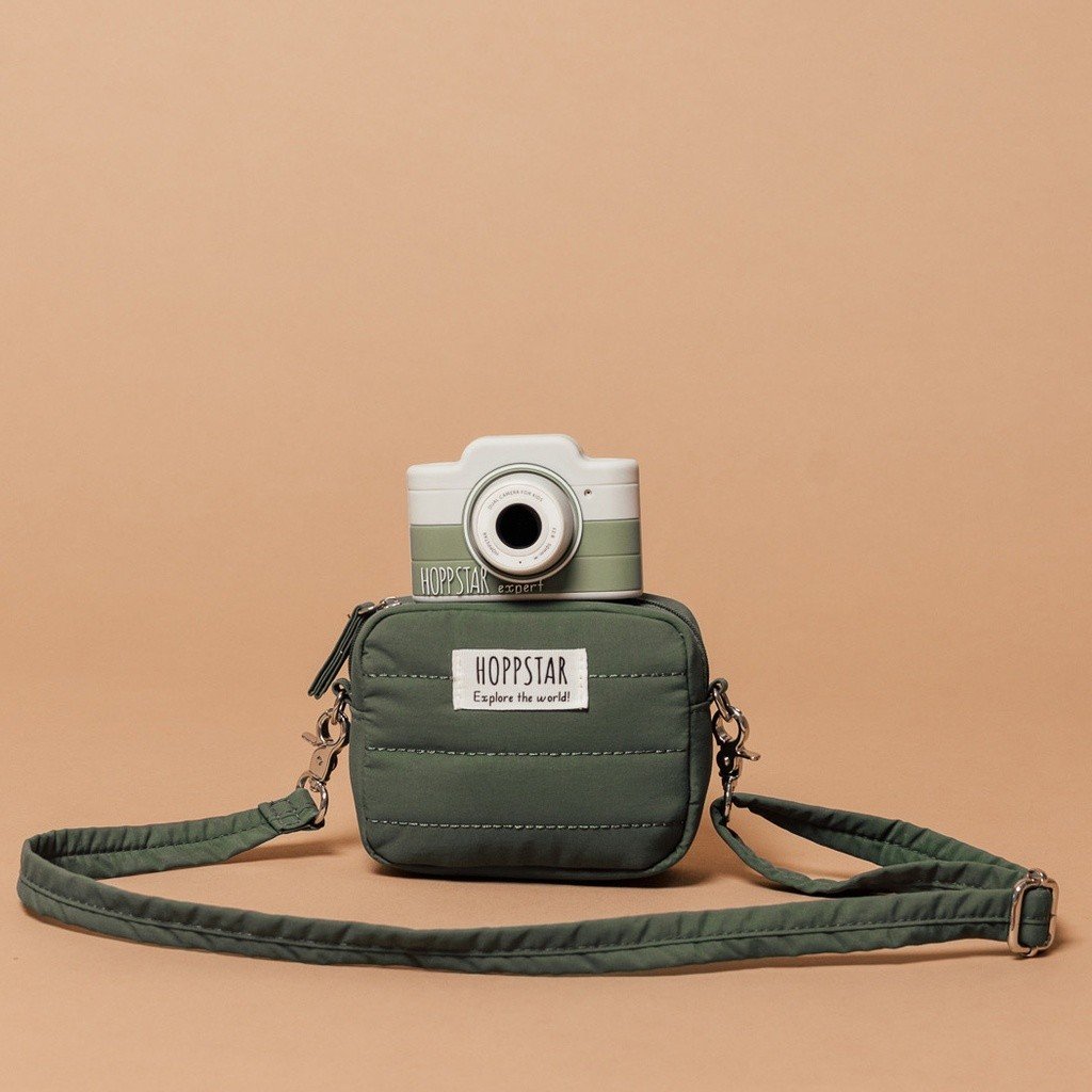 1. Green Hoppstar Expert camera with matching bag on peach background