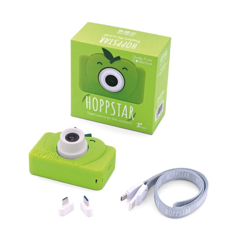 2. Green Hoppstar Rookie camera with packaging, USB cable, and adapters on white background