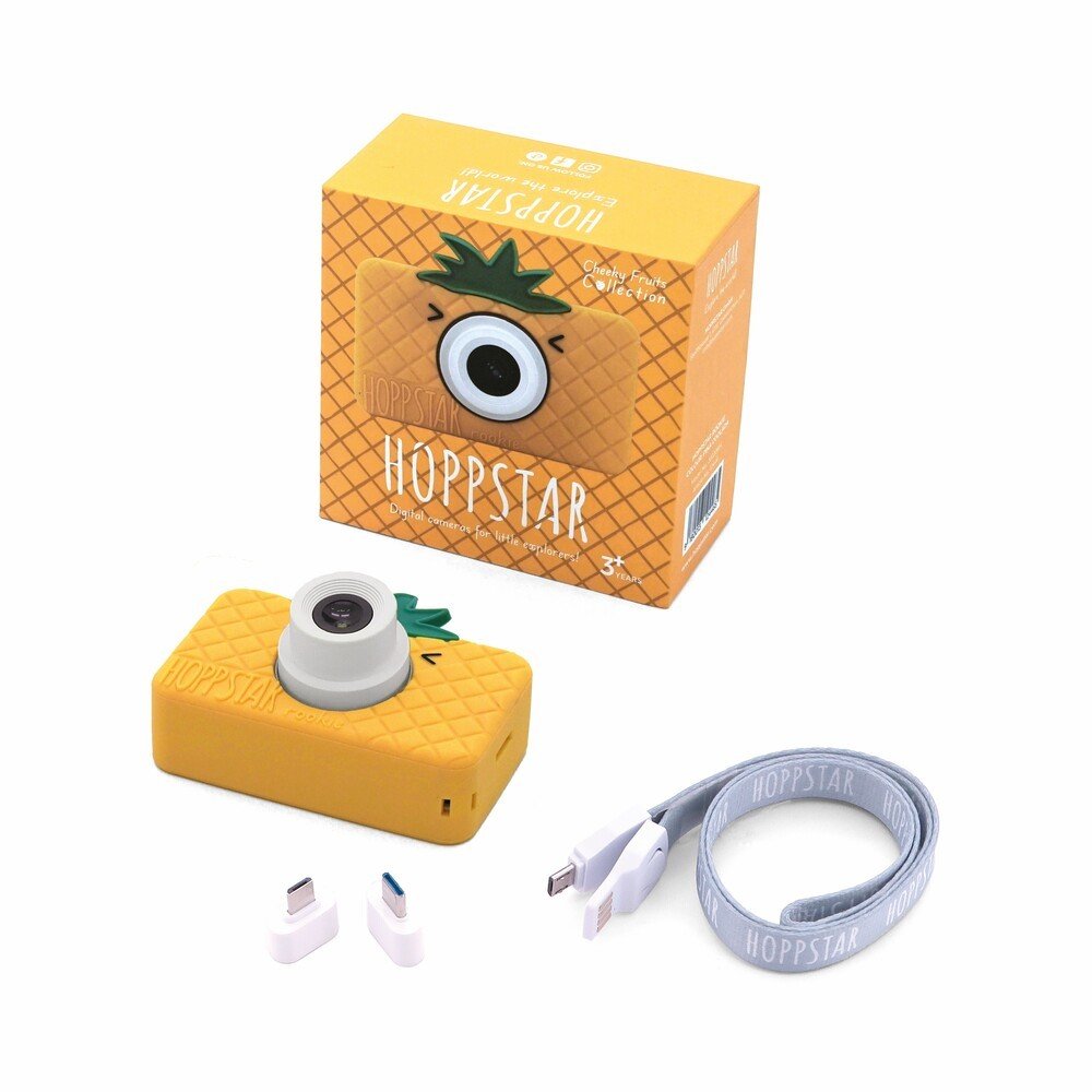 2. Yellow Hoppstar Rookie camera with packaging, USB cable, and adapters on white background