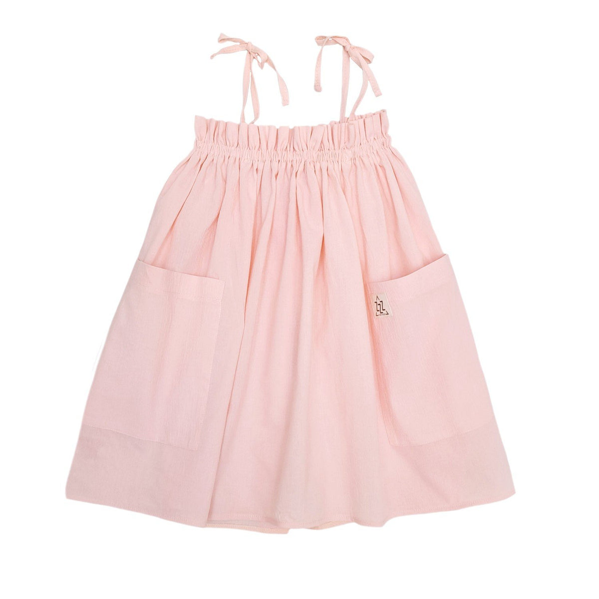 5. Flat lay of peach dress with adjustable shoulder ties and front pockets on white background