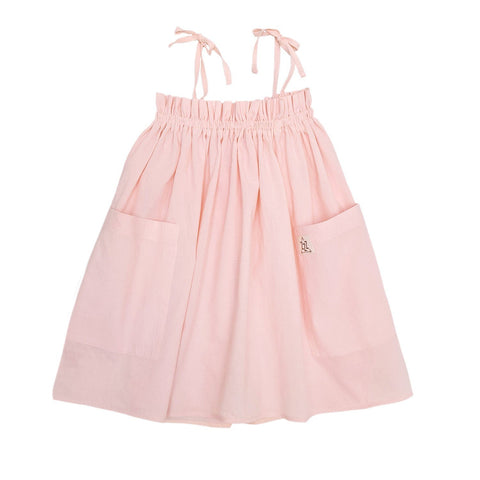5. Flat lay of peach dress with adjustable shoulder ties and front pockets on white background