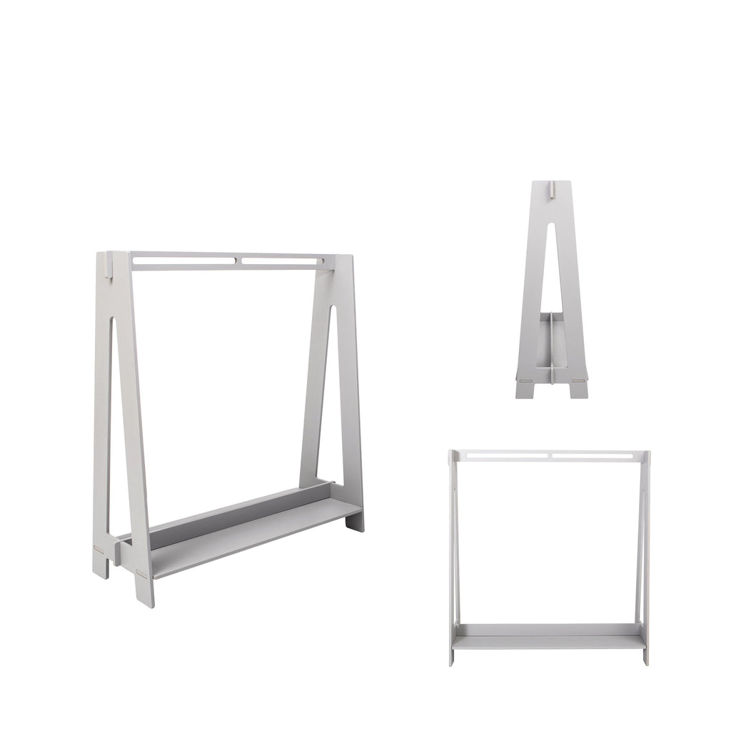 12. Natural wood toddler clothing rack with colorful children's clothes in a playful room