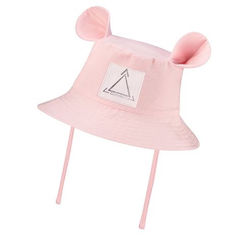2. Pink children's bucket hat with playful fabric ears and ties, featuring Zezuzulla logo on front, made from 100% OEKO-TEX cotton, shown in studio setting