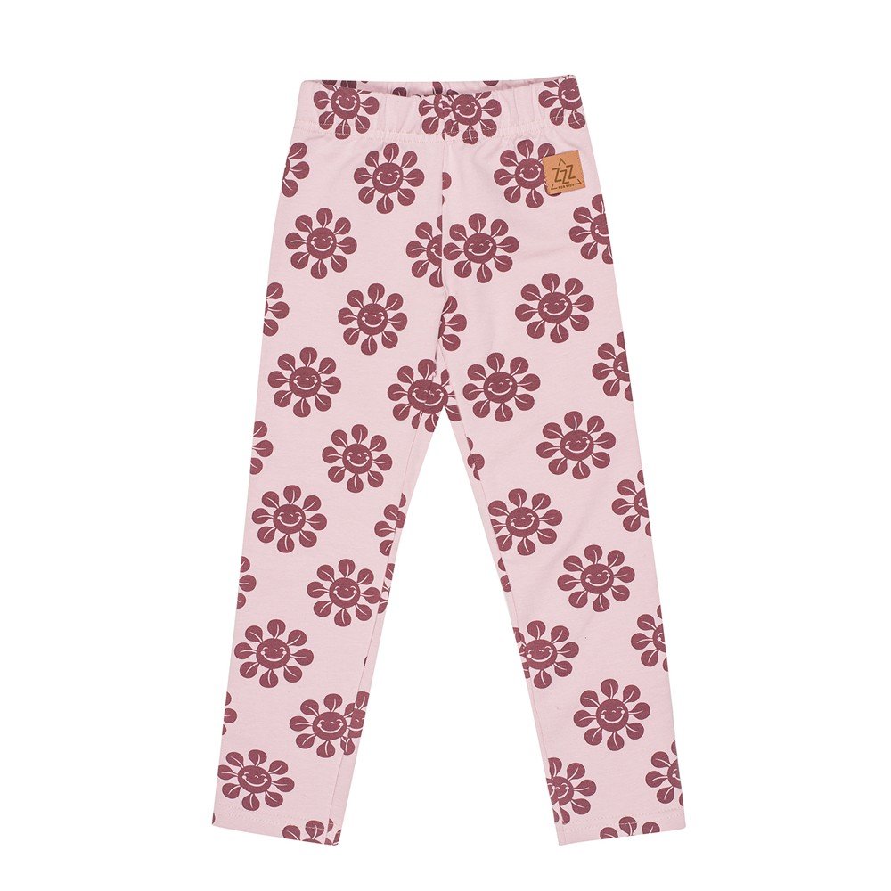 4. Flat lay of kids' pink leggings with maroon flower print and elastic waistband, featuring Zezuzulla logo patch on clean white background