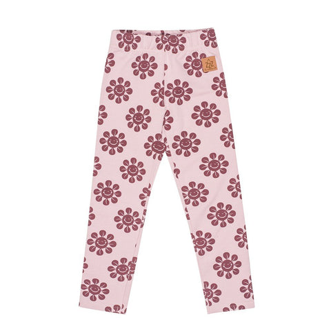 4. Flat lay of kids' pink leggings with maroon flower print and elastic waistband, featuring Zezuzulla logo patch on clean white background