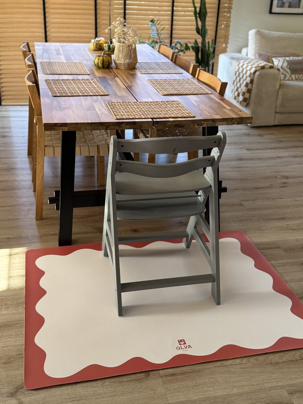 1. Dining room setting with high chair on OLYA KIDS red-framed waterproof floor mat protecting wooden floor