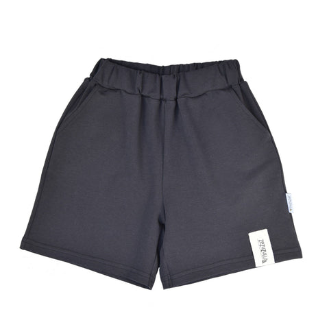 2. Kids' dark antrachite cotton shorts with elastic waistband and pockets, featuring Zezuzulla label, shown in studio setting