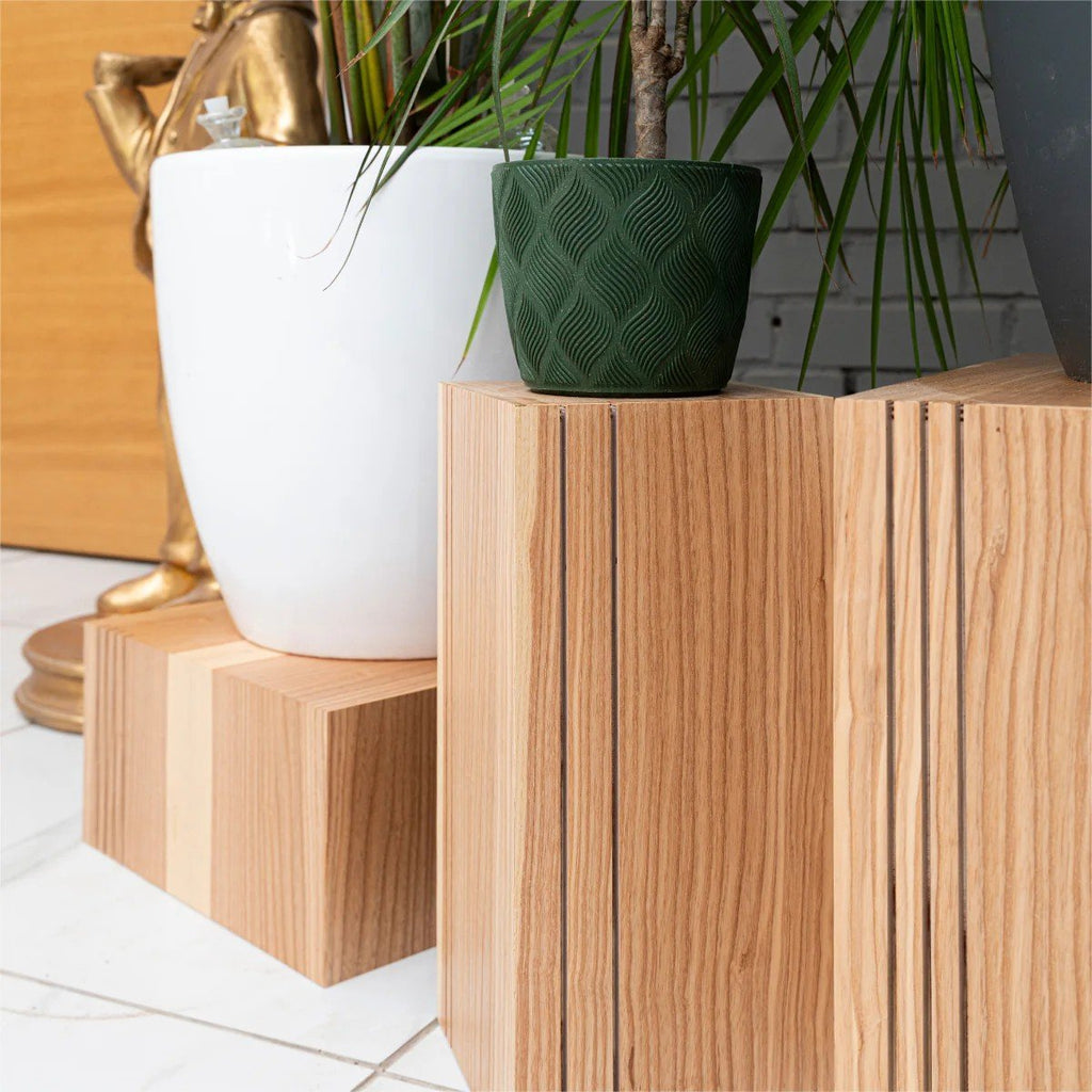 6. Close-up of wooden plant stands with potted plants highlighting wood grain and design details