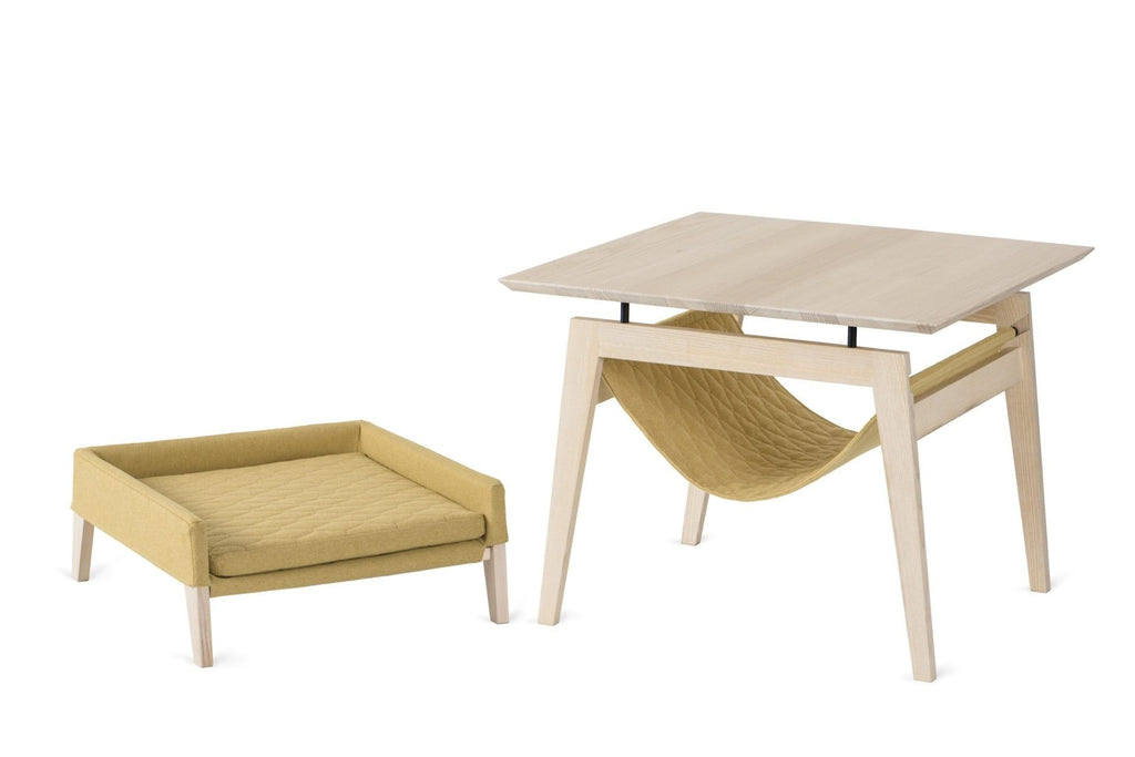 4. Studio shot of Labbvenn Kikko table and Lulu bed in honey color, showcasing modern design and ash wood construction