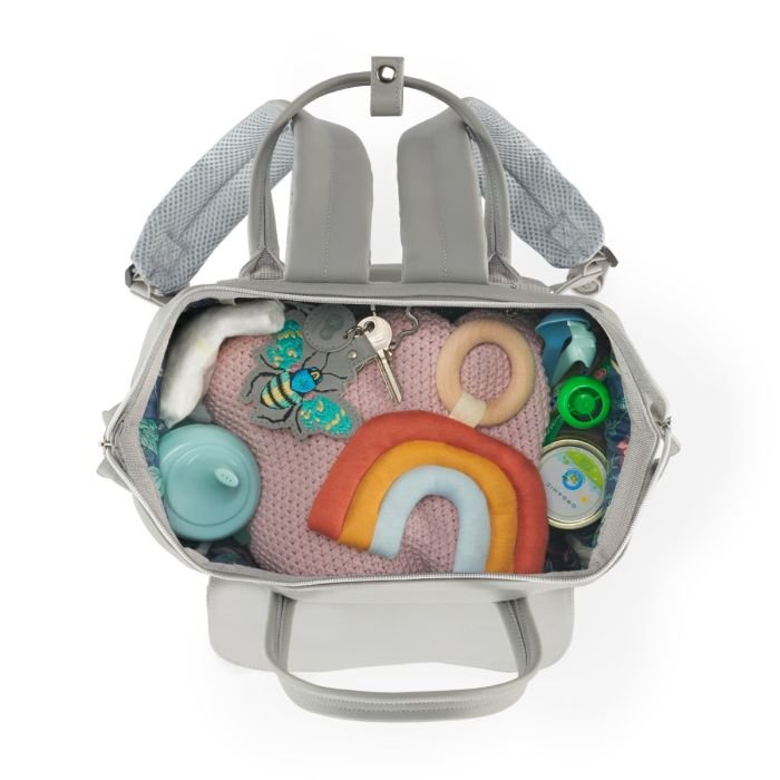 4. Open Kinderkraft Treasureback backpack filled with baby essentials including toys and bottles