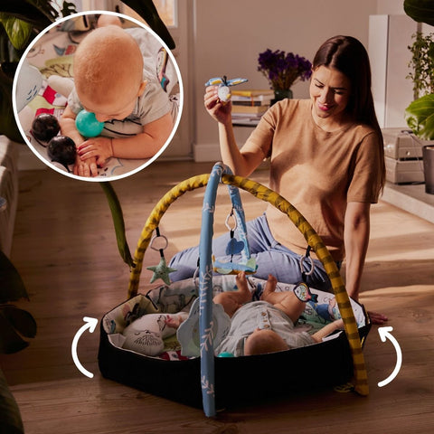 1. Woman playing with baby on Kinderkraft Smartplay Sea playmat with plush toys in living room