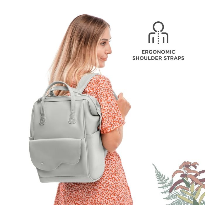 8. Woman wearing grey Kinderkraft Treasureback backpack with ergonomic shoulder straps
