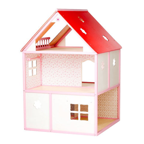 3. Side view of pink and white dollhouse with red roof, floral wallpaper, and window cutouts, in studio setting