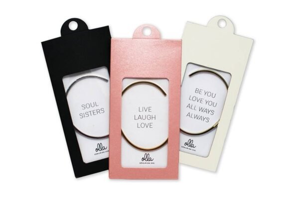 4. Packaging of Olla bracelets including Live Laugh Love, Soul Sisters, and Be You Love You designs