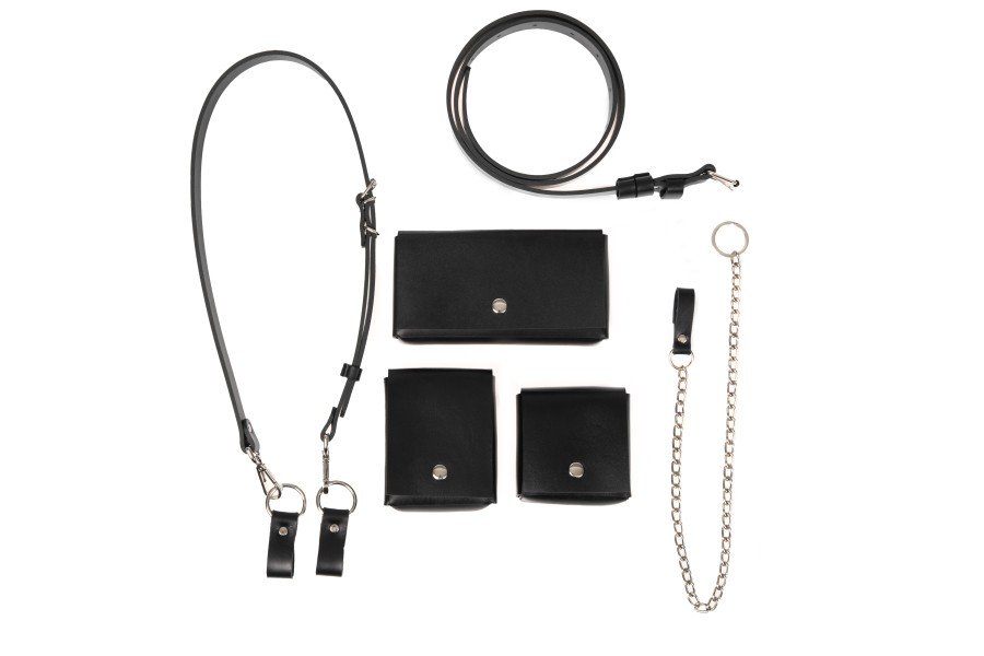 7. Studio shot of unisex leather body harness Kora No3 by PYKOK, highlighting adjustable strap and mini bags