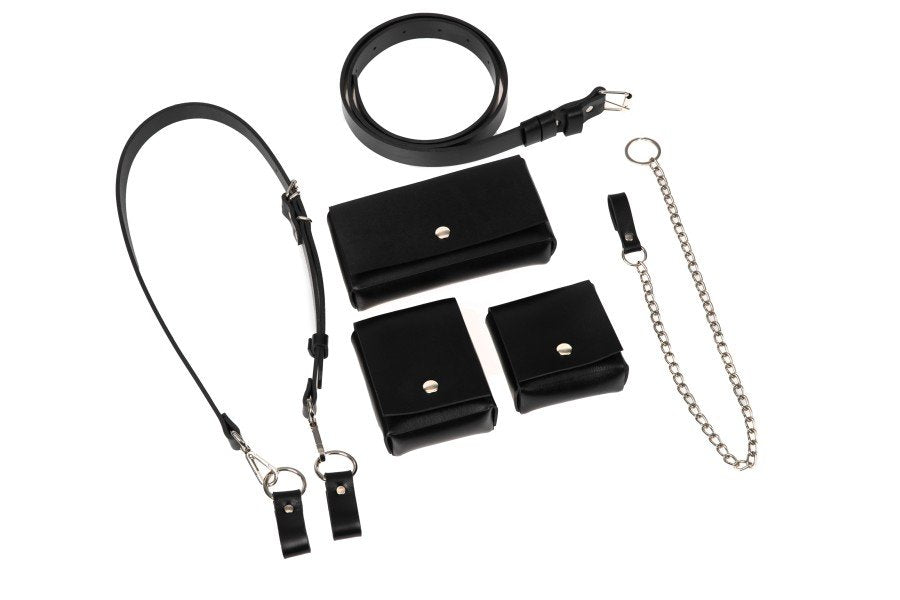 6. Flat lay of unisex leather body harness Kora No3 by PYKOK, featuring belt, shoulder strap, mini bags, and chain