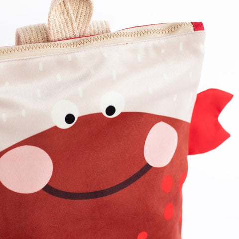 5. Close-up of Muni kids crab backpack, focusing on crab design and velvet texture