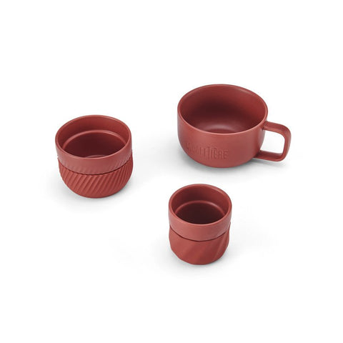 2. La Cafetière red coffee mugs set of three on white background, showing different sizes and silicone bands
