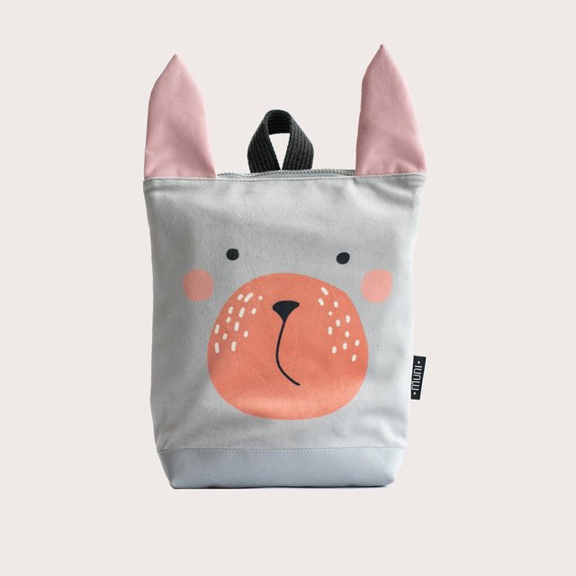 4. Muni Bunny kids backpack in studio, featuring bunny face design and pink ears