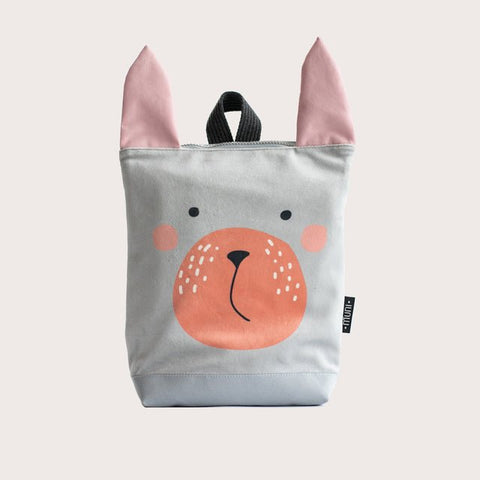 4. Muni Bunny kids backpack in studio, featuring bunny face design and pink ears